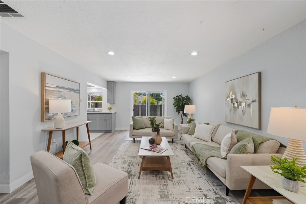 916 Othello Street Arcadia, CA 91006 - Photo 19 of 56 a living room with furniture and a wooden floor