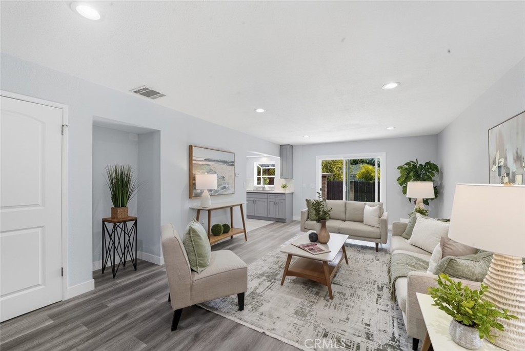 916 Othello Street Arcadia, CA 91006 - Photo 20 of 56 a living room with furniture and a wooden floor