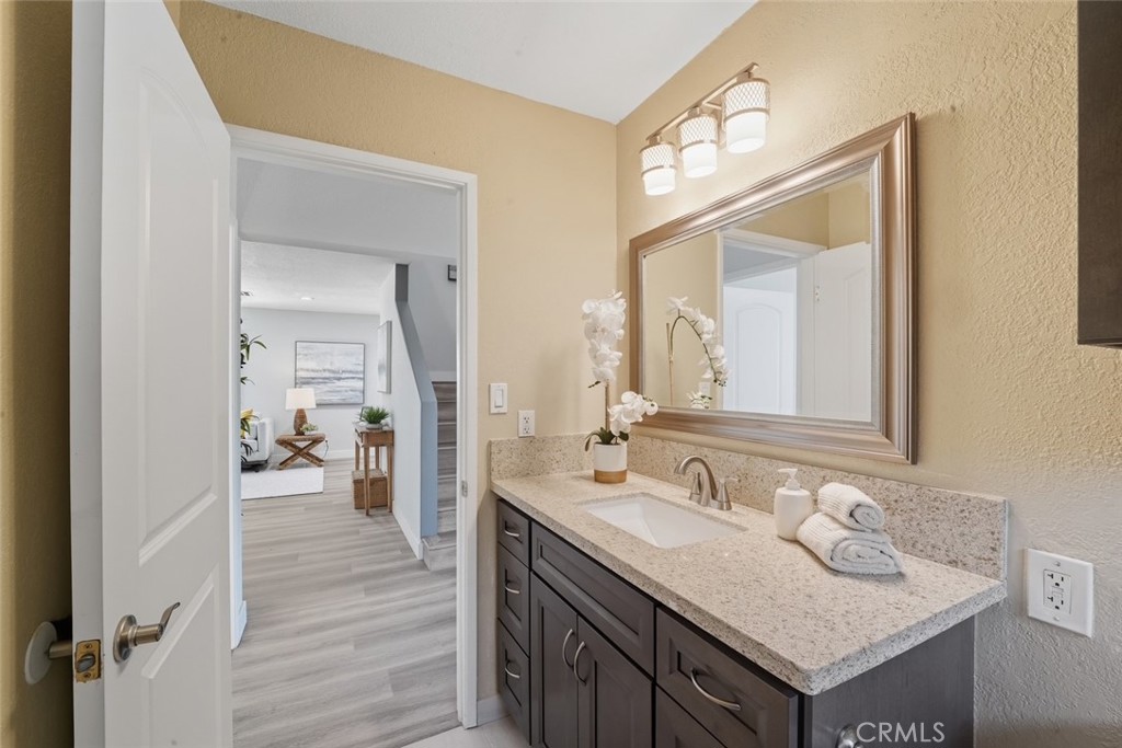 916 Othello Street Arcadia, CA 91006 - Photo 26 of 56 a bathroom with a sink and a mirror