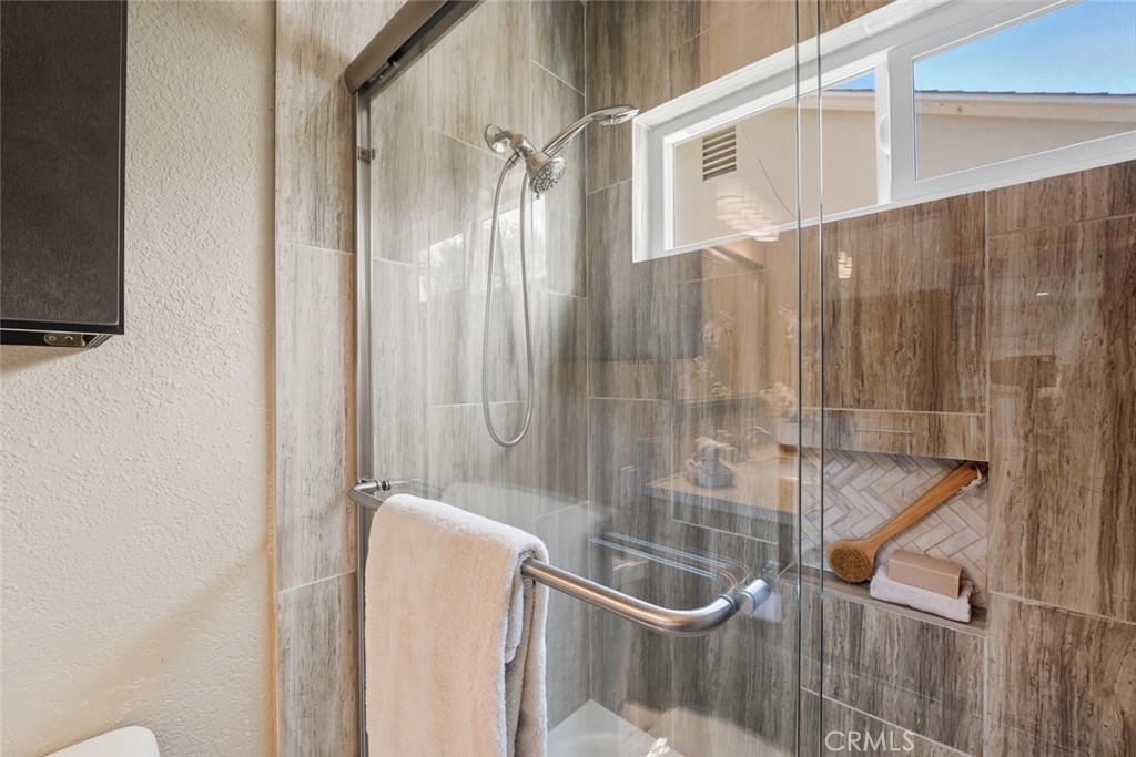 916 Othello Street Arcadia, CA 91006 - Photo 27 of 56 a bathroom with a shower and a sink