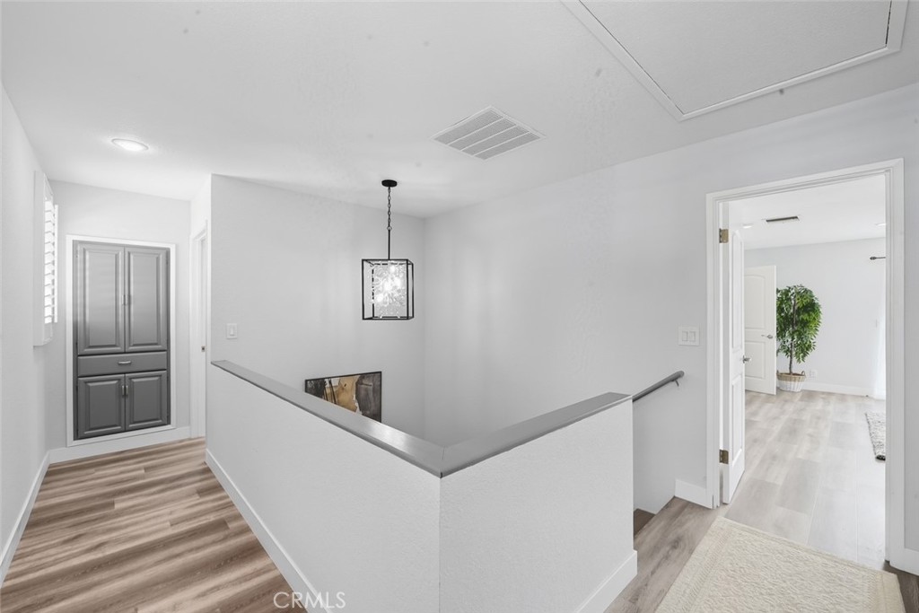 916 Othello Street Arcadia, CA 91006 - Photo 29 of 56 a view of hallway with stairs and wooden floor