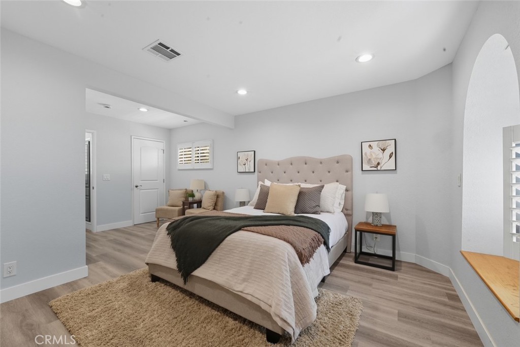 916 Othello Street Arcadia, CA 91006 - Photo 35 of 56 a spacious bedroom with a bed and a table