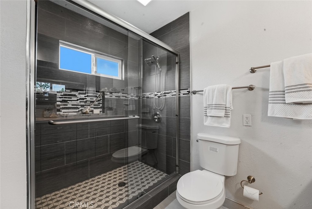916 Othello Street Arcadia, CA 91006 - Photo 42 of 56 a bathroom with a toilet and a shower
