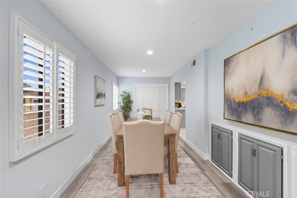 916 Othello Street Arcadia, CA 91006 - Photo 8 of 56 a view of a dining room with furniture a rug and wooden floor