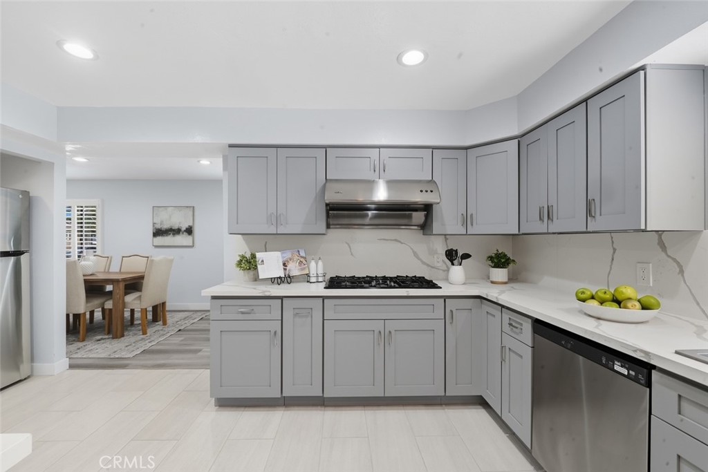 916 Othello Street Arcadia, CA 91006 - Photo 10 of 56 a kitchen with stainless steel appliances granite countertop a sink and cabinets