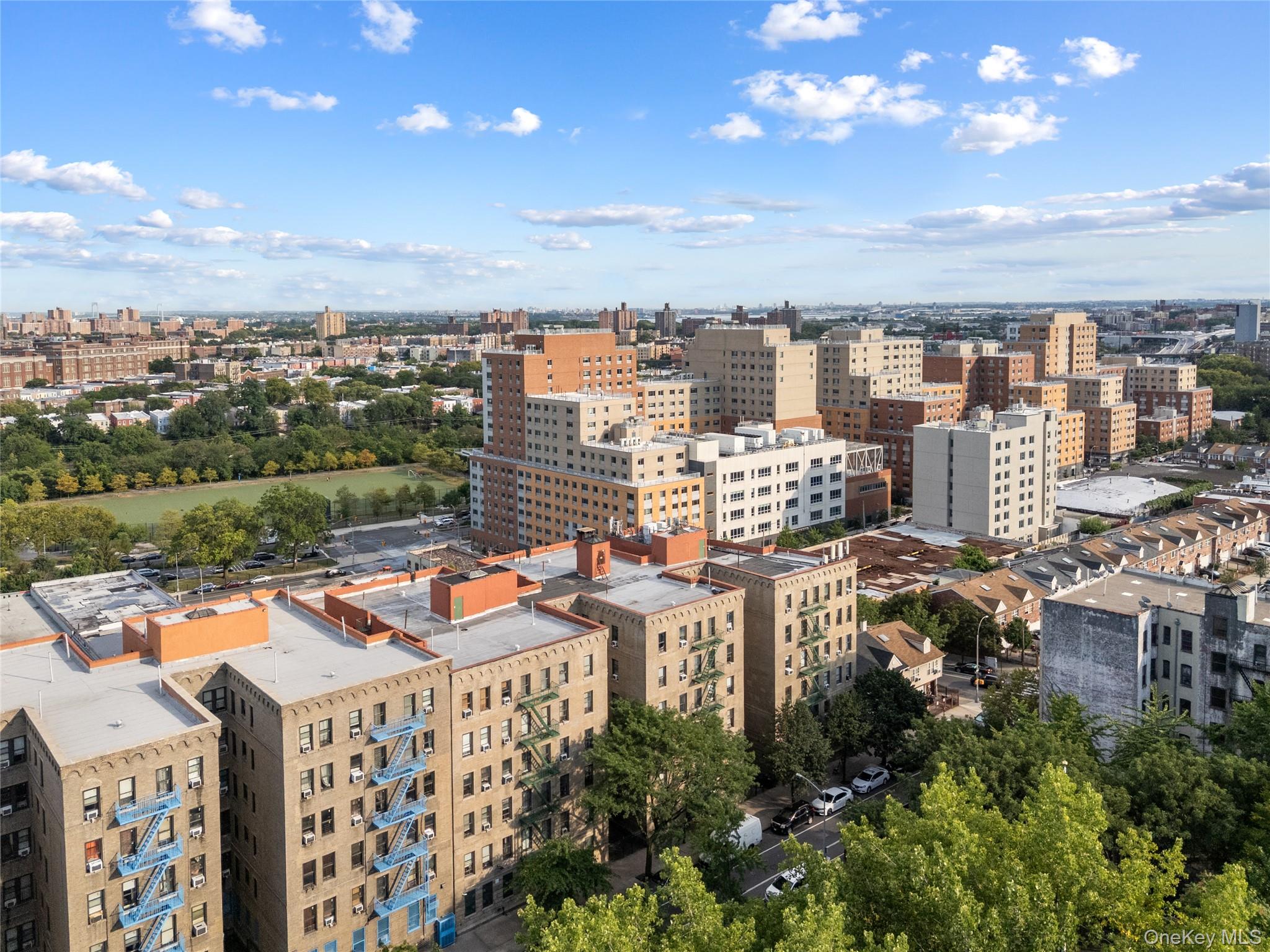a view of a city with lawn chairs
