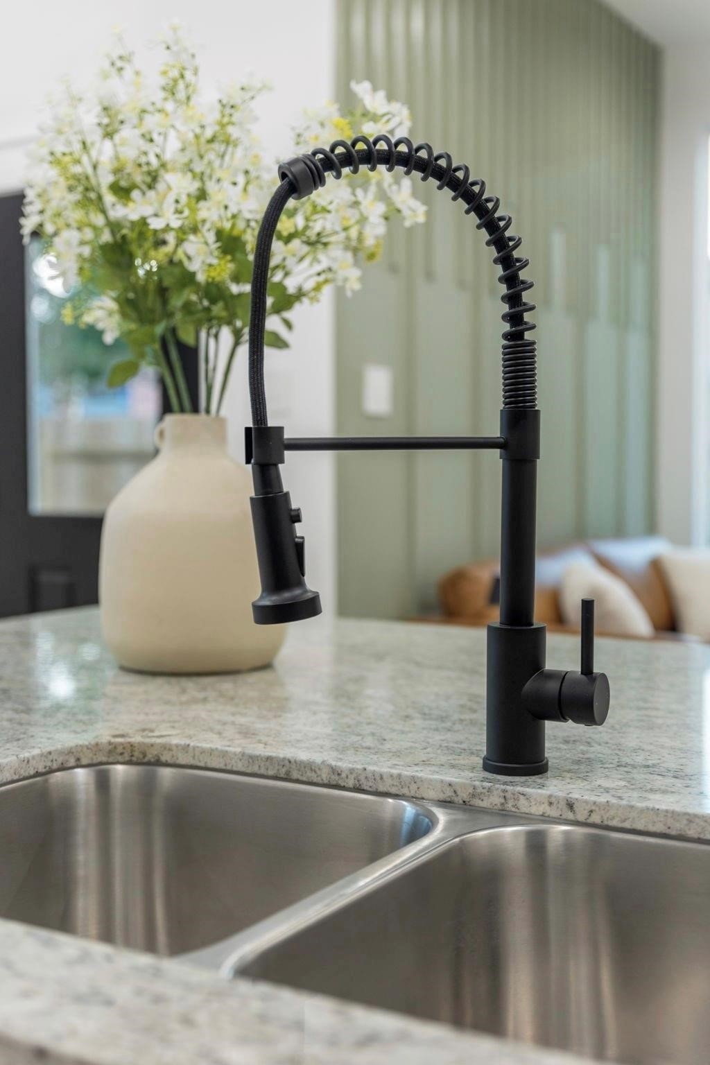 518 Clinton Street, Unit B Conroe, TX 77301 - Photo 12 of 50 a close view of kitchen sink