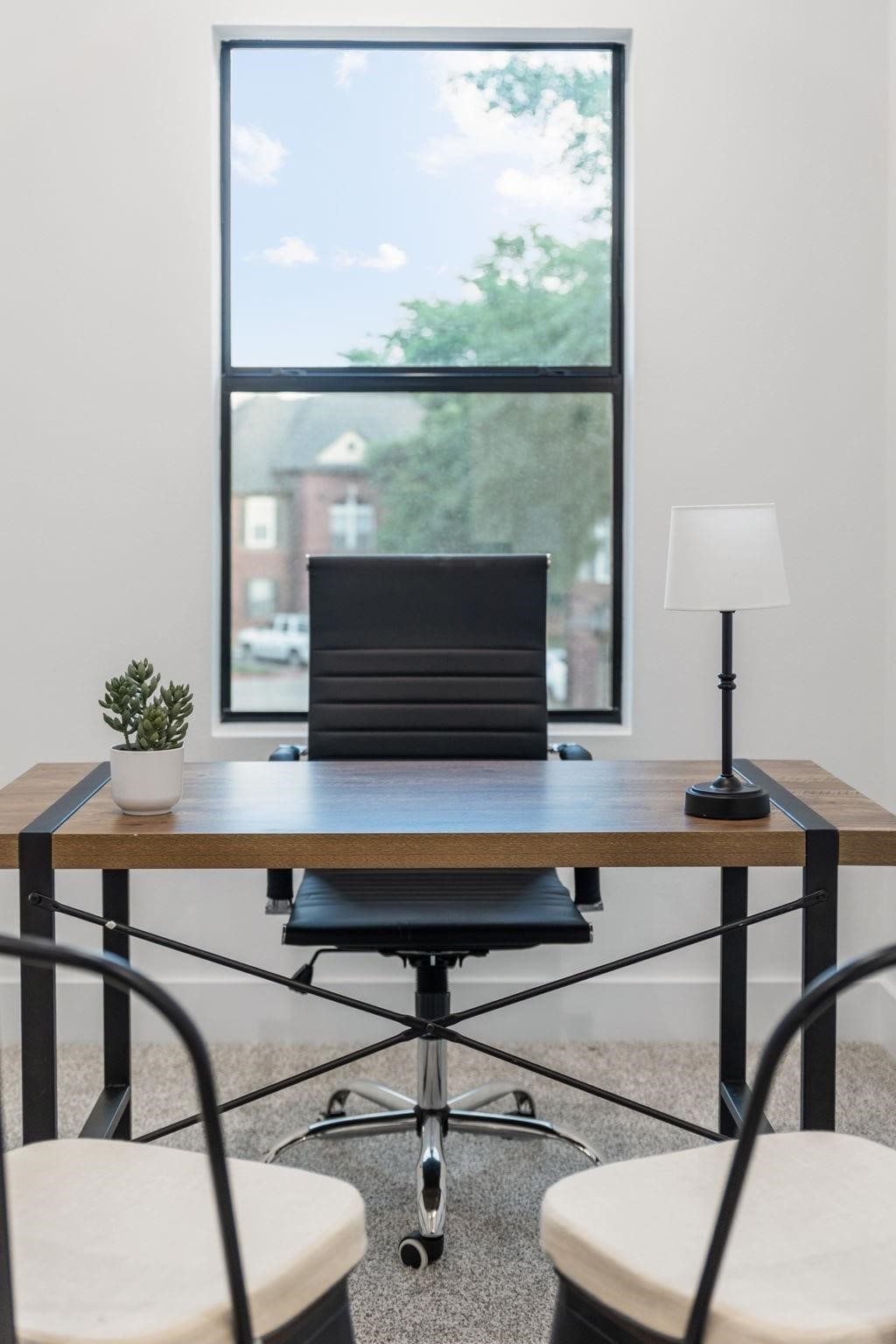 518 Clinton Street, Unit B Conroe, TX 77301 - Photo 28 of 50 a view of a outdoor space with seating area