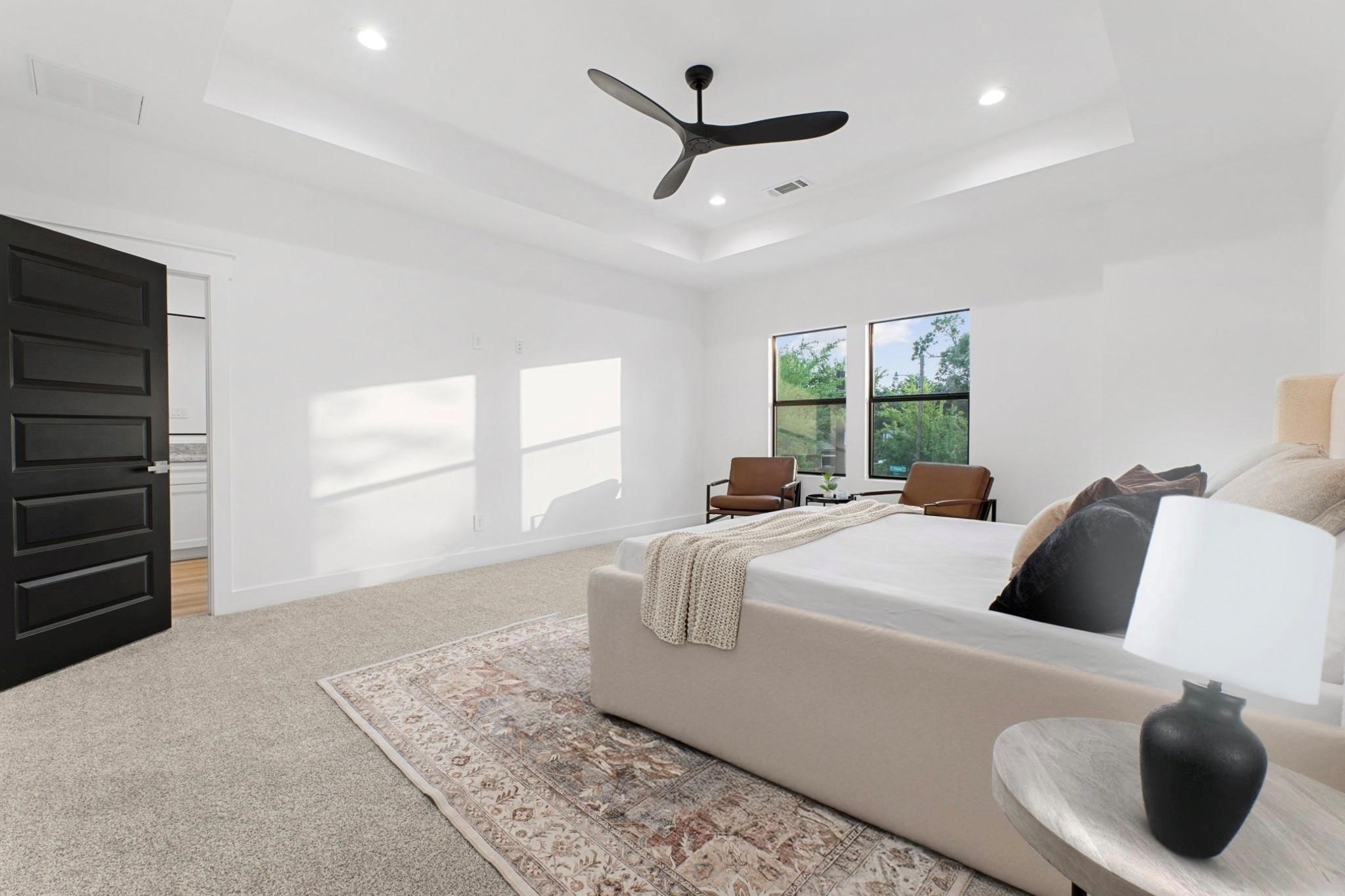 518 Clinton Street, Unit B Conroe, TX 77301 - Photo 30 of 50 a living room with a bed furniture and a window