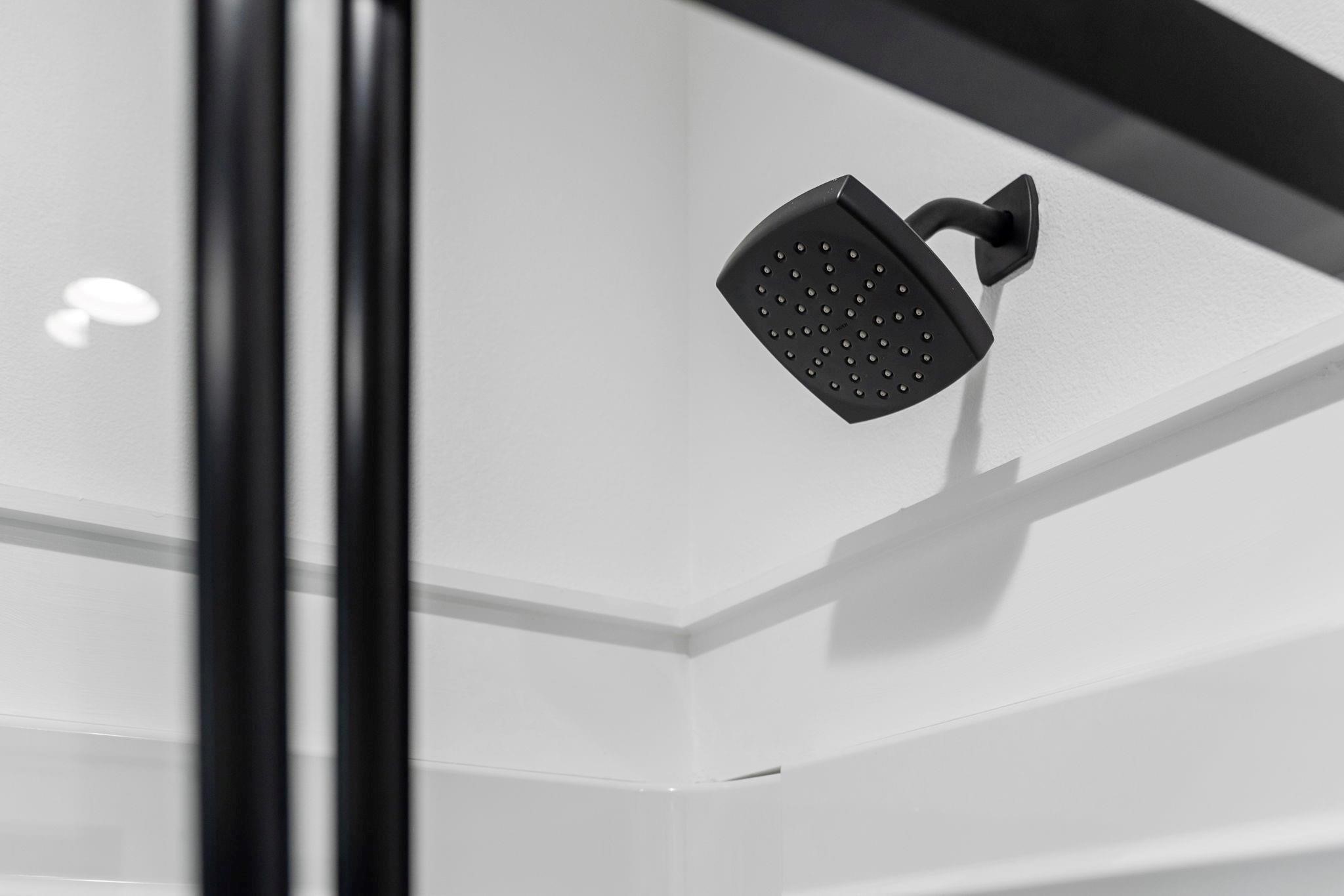 518 Clinton Street, Unit B Conroe, TX 77301 - Photo 34 of 50 a close view of a shower curtain and a sink