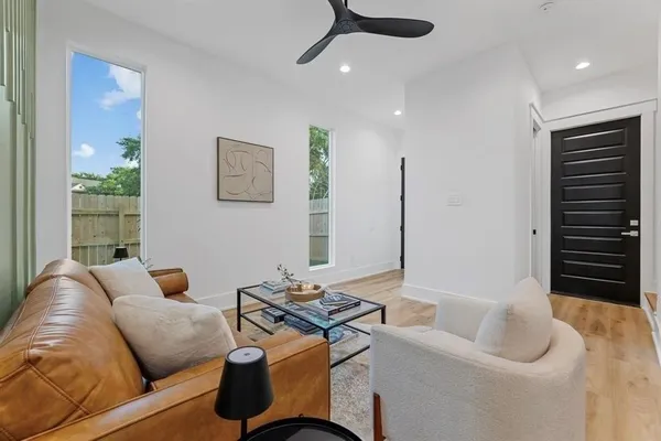a living room with furniture and a couch