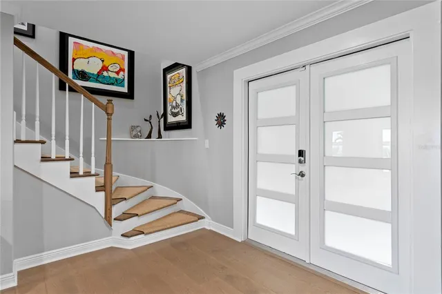 a living room with furniture lamp and rug