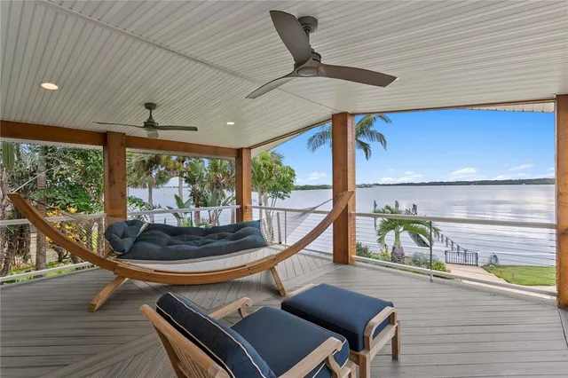 a bathroom with a granite countertop sink a mirror and a vanity