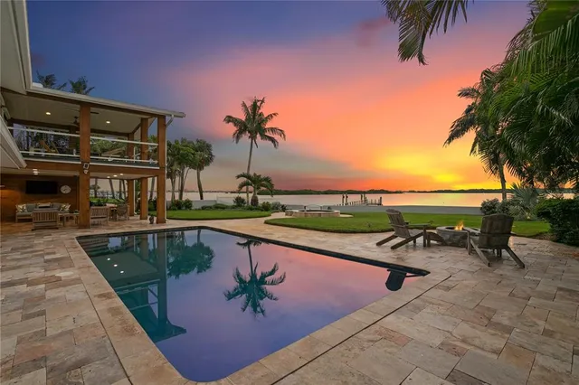 a view of a lake with a yard and ocean view