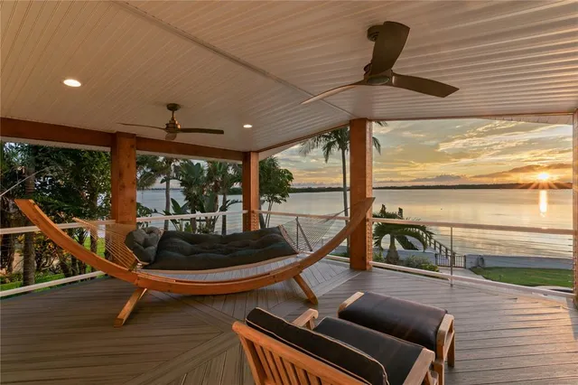 a view of a lake with a yard and ocean view
