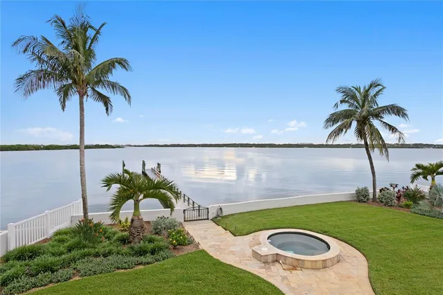 a view of swimming pool with a yard
