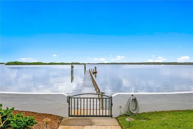 a view of outside space and a lake view
