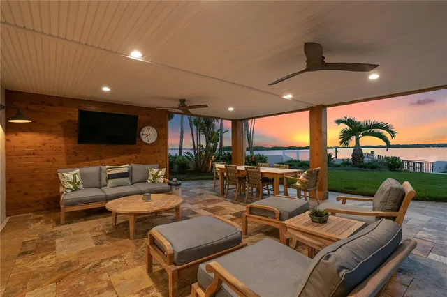 a view of a livingroom with furniture and a table