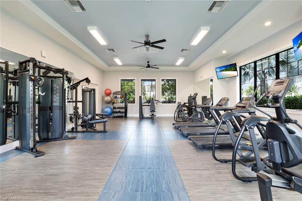 2647 Seychelles Circle, Unit 2204 Naples, FL 34112 - Photo 23 of 29 a view of a room with gym equipment