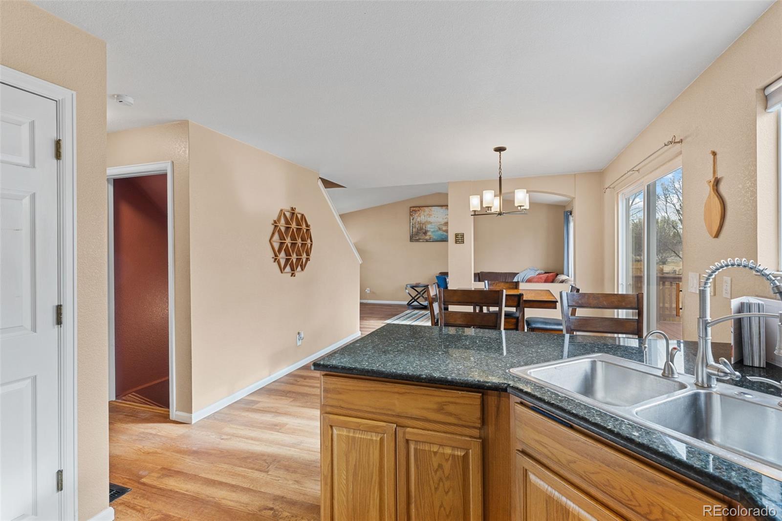 1189 Fall River Circle Longmont, CO 80504 - Photo 17 of 46 a kitchen with sink and window
