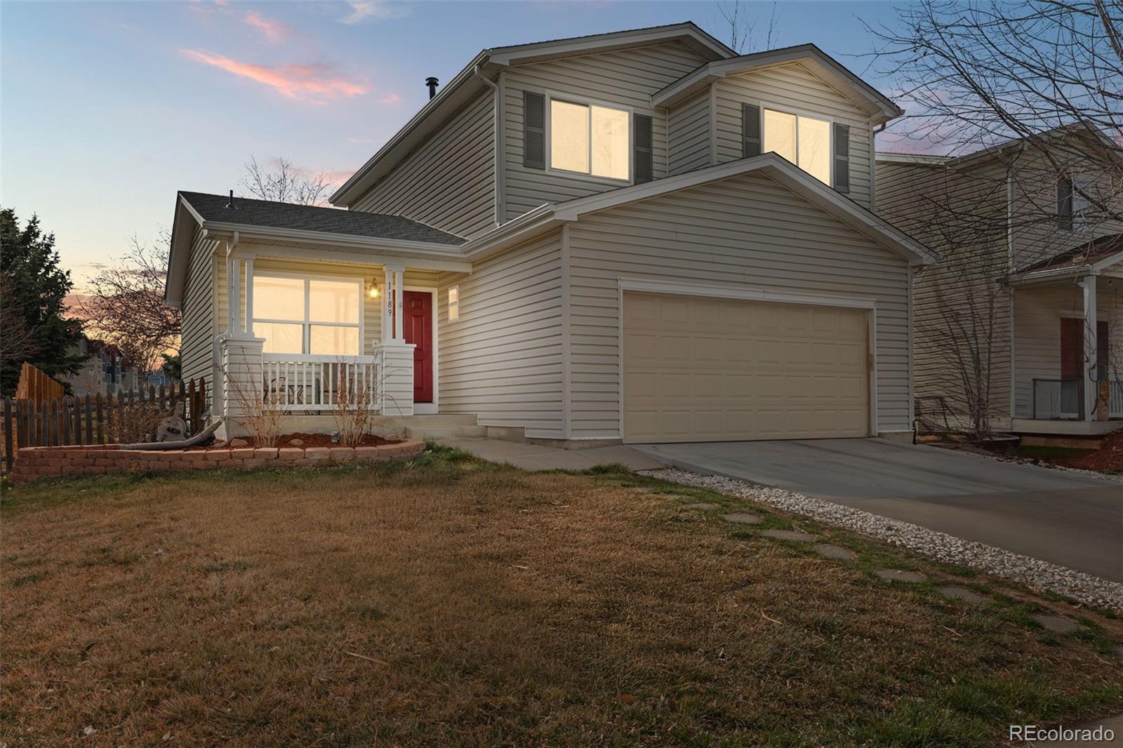 1189 Fall River Circle Longmont, CO 80504 - Photo 2 of 46 a house with a outdoor space