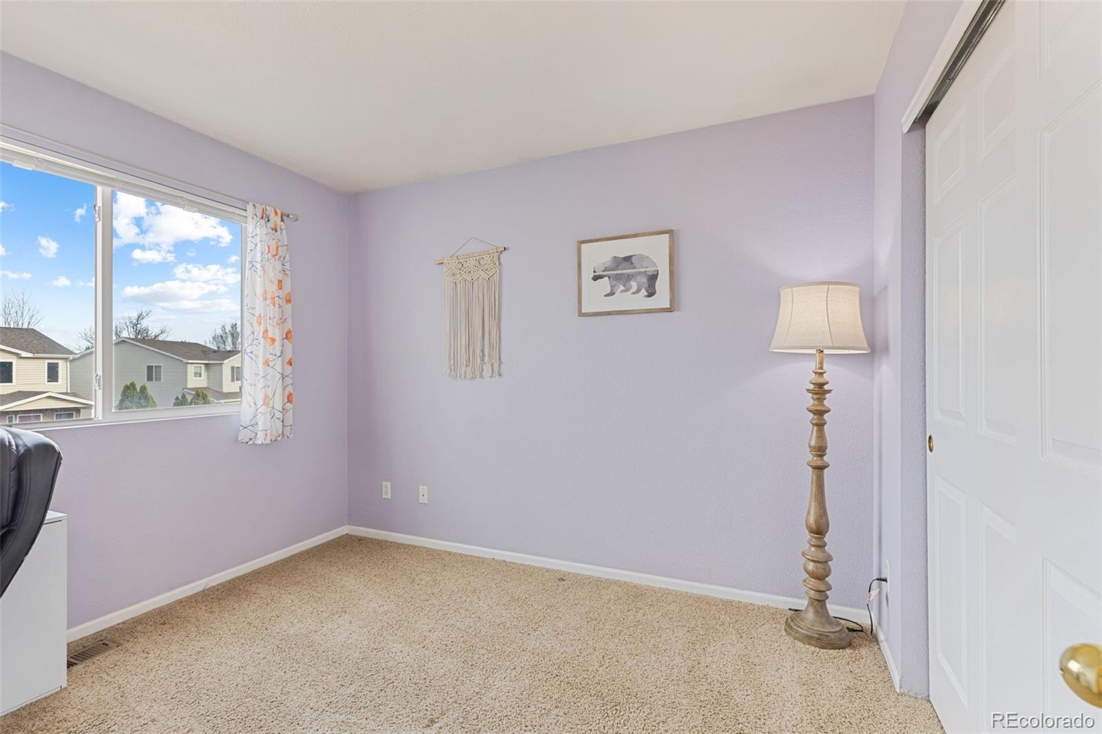 1189 Fall River Circle Longmont, CO 80504 - Photo 29 of 46 an empty room with a window