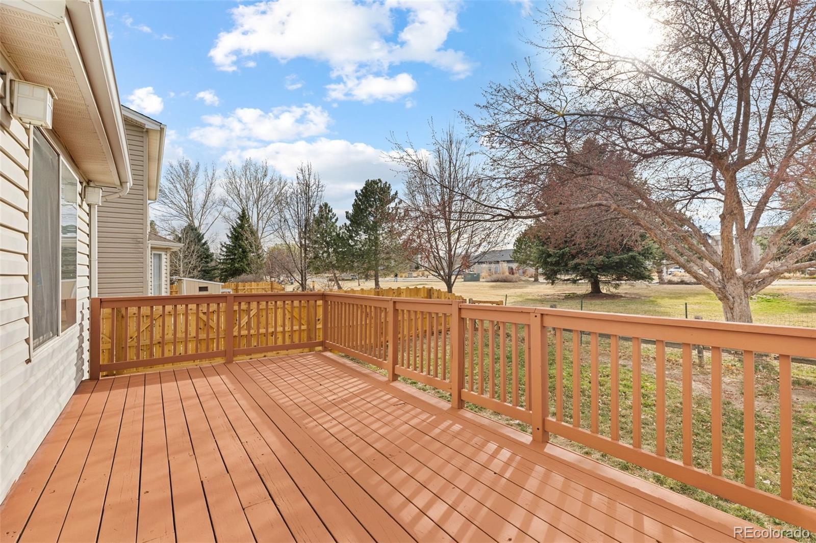 1189 Fall River Circle Longmont, CO 80504 - Photo 38 of 46 a view of balcony with wooden floor