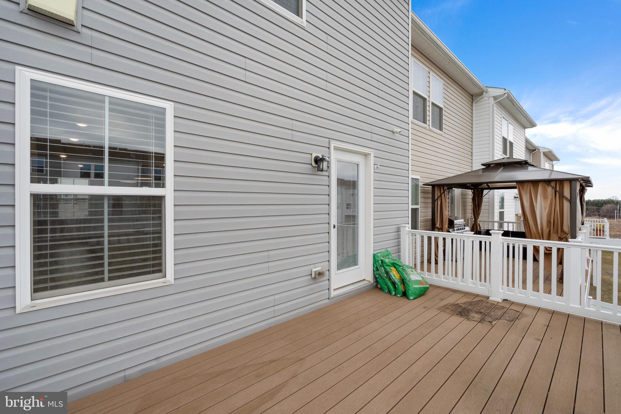 51 Thrower Road Hedgesville, WV 25427 - Photo 33 of 38 a view of a house with wooden deck