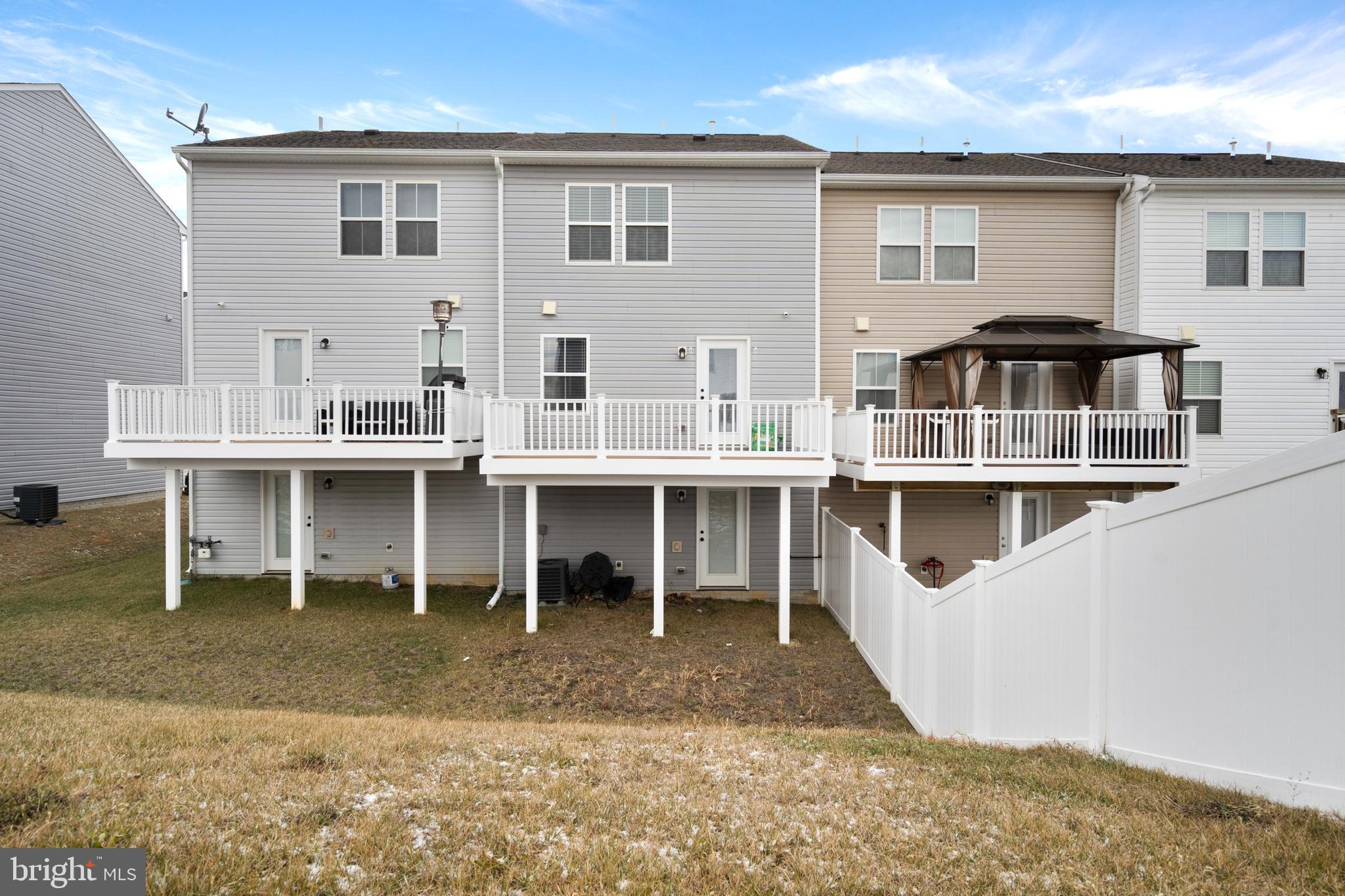 51 Thrower Road Hedgesville, WV 25427 - Photo 34 of 38 a view of a house with a backyard and balcony