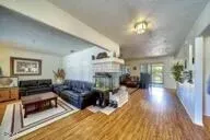 a bathroom with a sink toilet and a mirror