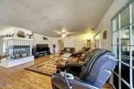 a room with furniture and a flat screen tv