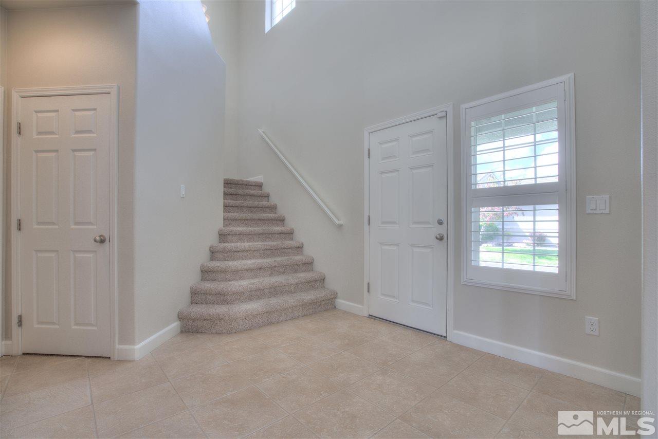 10490 Chadwell Drive Reno, NV 89521 - Photo 15 of 36 a view of entryway with stairs