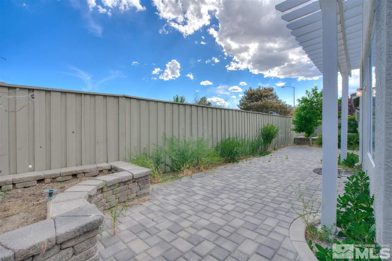 10490 Chadwell Drive Reno, NV 89521 - Photo 35 of 36 a backyard of a house with lots of green space