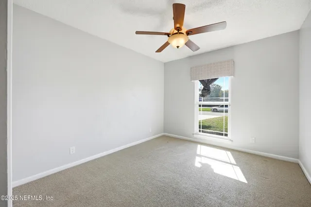 an empty room and window