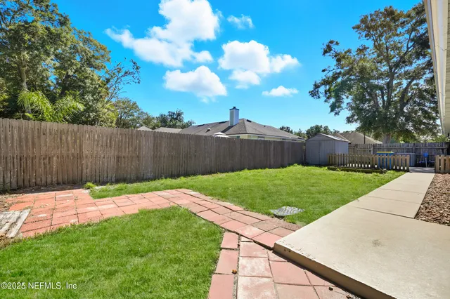a garden view with a seating space