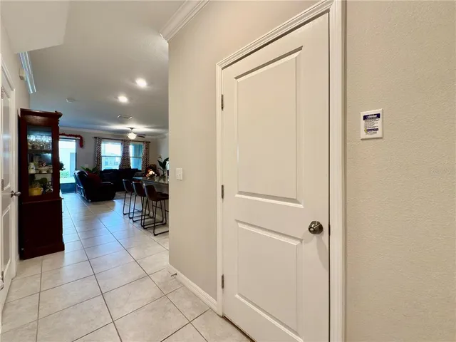 a view of a workspace with furniture and wooden floor