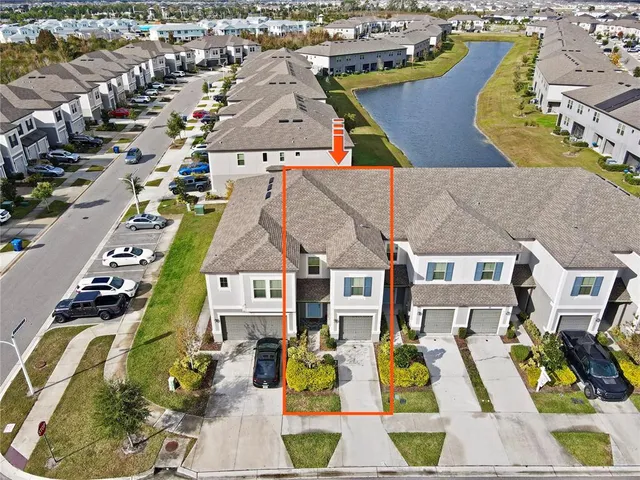 a bedroom with a bed and a dresser in it