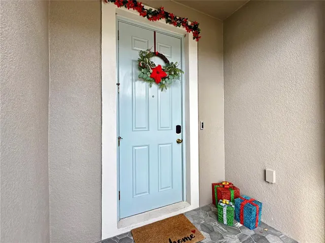 a kitchen with a sink a stove cabinets and counter space