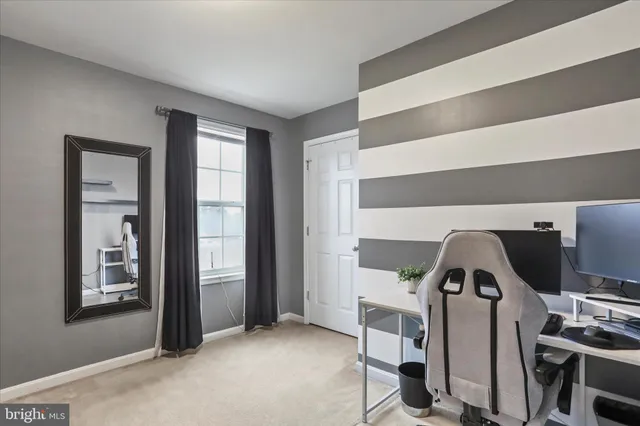 a view of livingroom with furniture and window