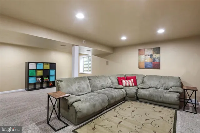 a living room with furniture and a couch