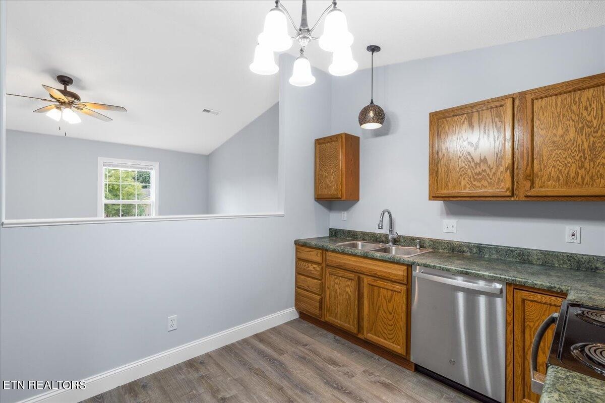 731 High Point Way, Knoxville, TN 37912 - Photo 14 of 25 a kitchen with sink cabinets and window