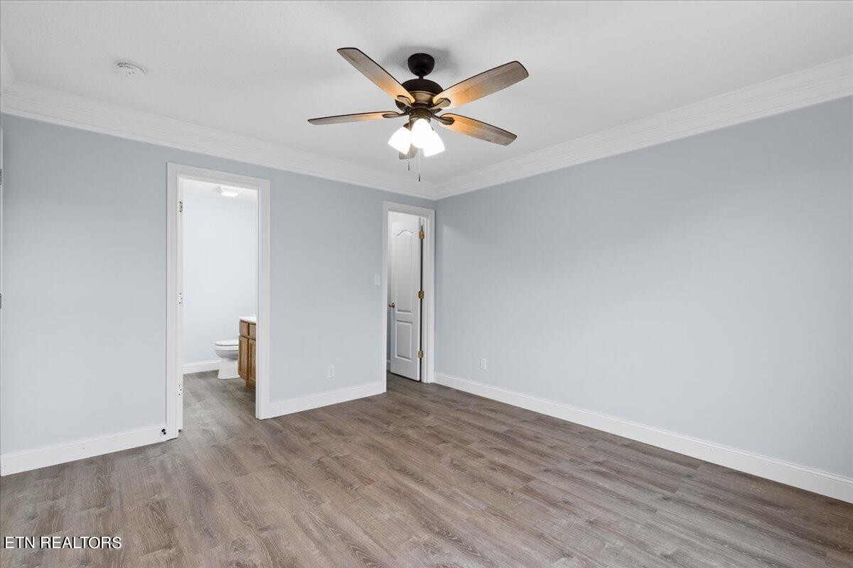 731 High Point Way, Knoxville, TN 37912 - Photo 20 of 25 an a view of an empty room with wooden floor