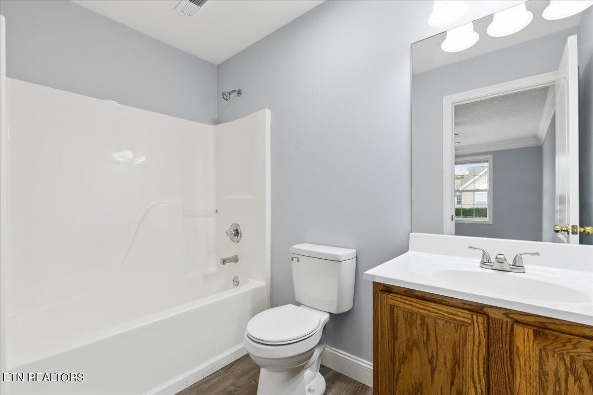 731 High Point Way, Knoxville, TN 37912 - Photo 7 of 25 a bathroom with a sink toilet and shower