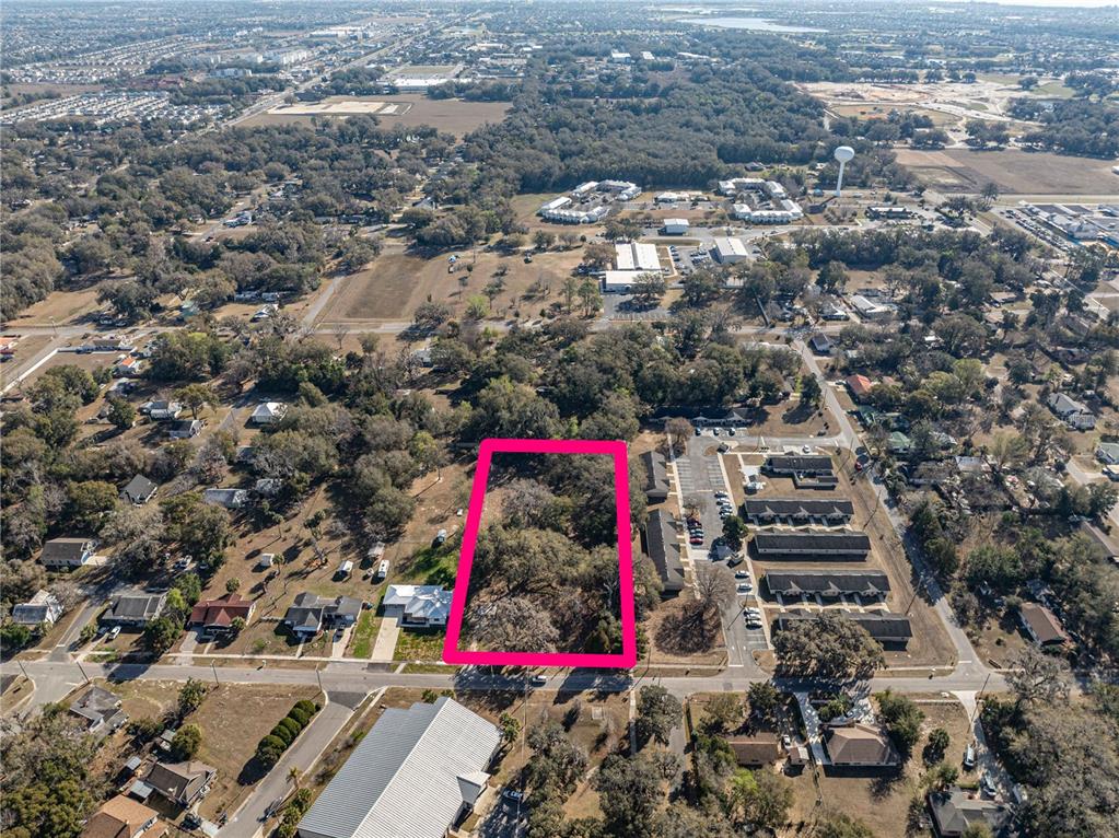 100 South Old Wire Road Wildwood, FL 34785 - Photo 14 of 16 an outdoor space with lots of trees