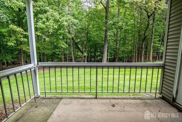 a view of a street from a balcony
