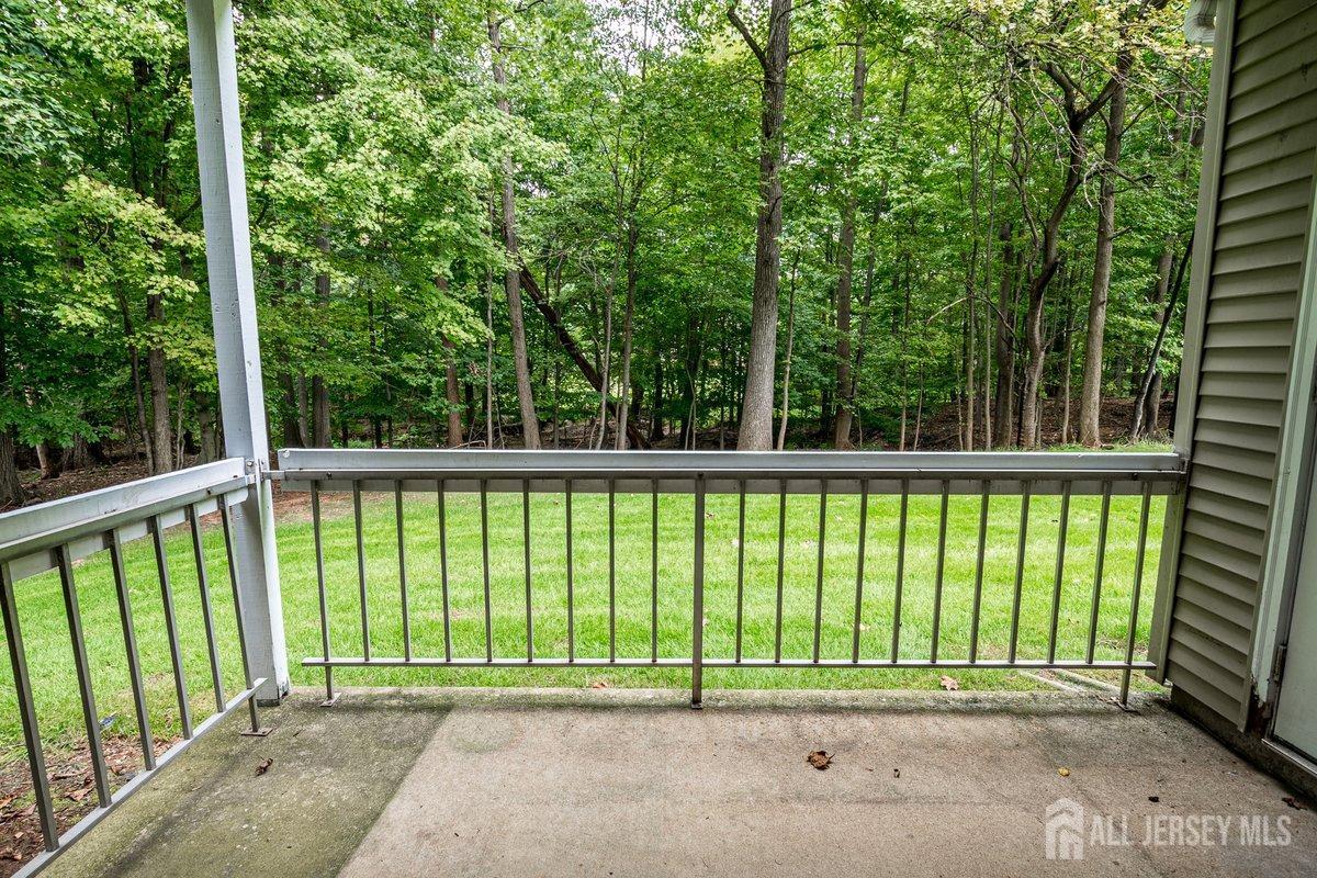 5001 Stonehedge Road Edison, NJ 08820 - Photo 7 of 22 a view of a street from a balcony