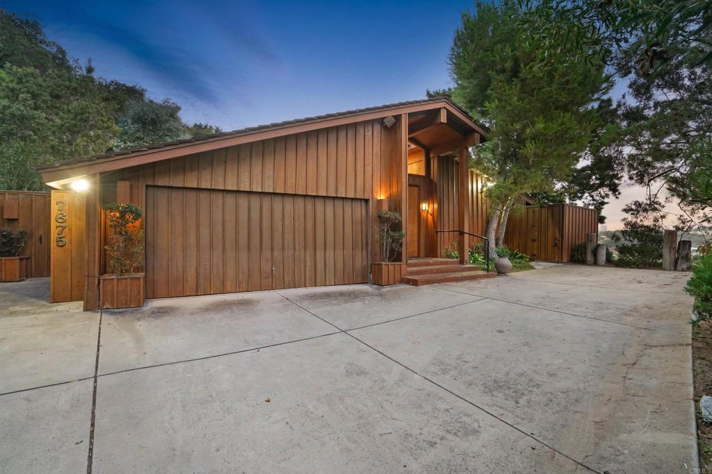 7675 Via Capri La Jolla, CA 92037 - Photo 1 of 75 a view of a house with a backyard