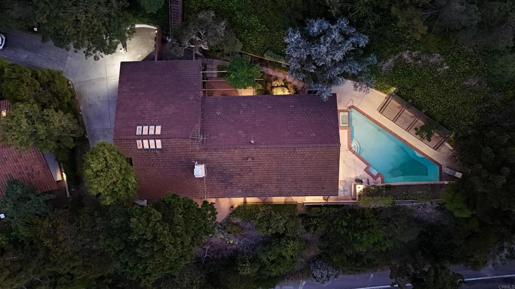 7675 Via Capri La Jolla, CA 92037 - Photo 4 of 75 an aerial view of a house with a yard and garden