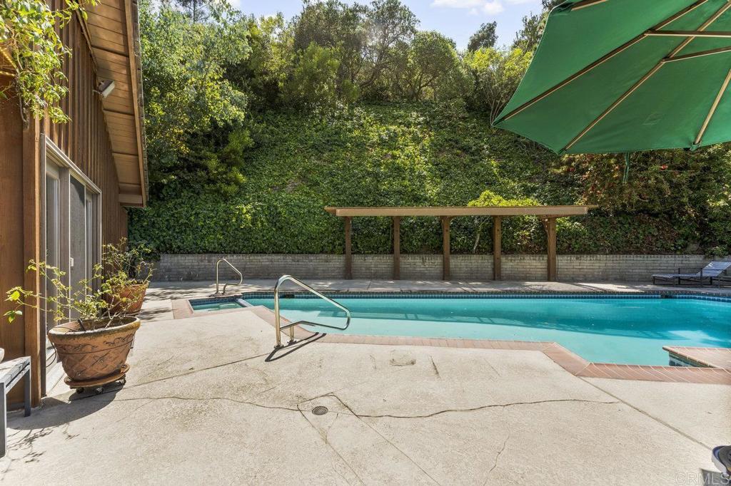 7675 Via Capri La Jolla, CA 92037 - Photo 50 of 75 a view of backyard with seating area and green space