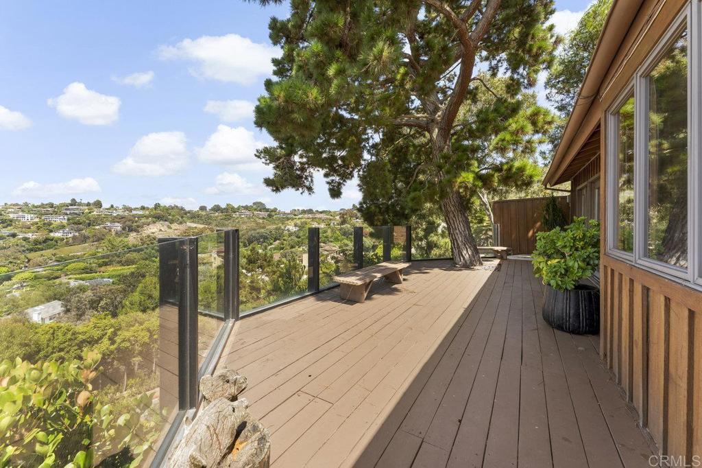 7675 Via Capri La Jolla, CA 92037 - Photo 55 of 75 a view of a balcony with wooden floor
